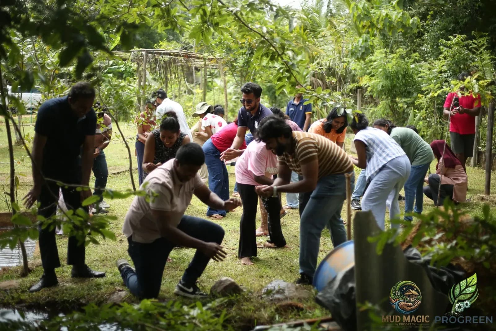 Participants planting together in the garden